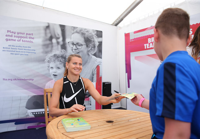 Lucy Safarova signing autographs at the Nottingham Open