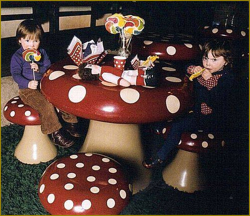 Children enjoying snacks on the Biba mushrooms