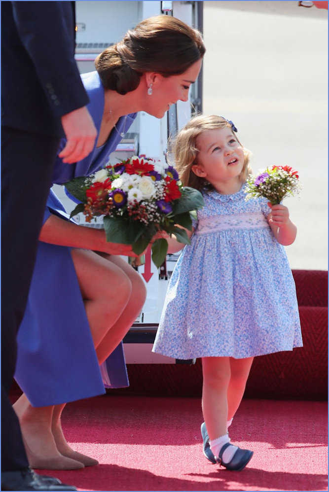 Duchess of Cambridge and Charlotte in Poland