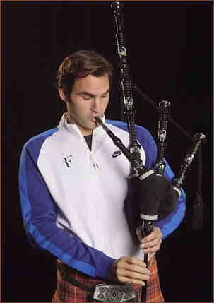 McFederer attempting the bagpipes in Glasgow 2017