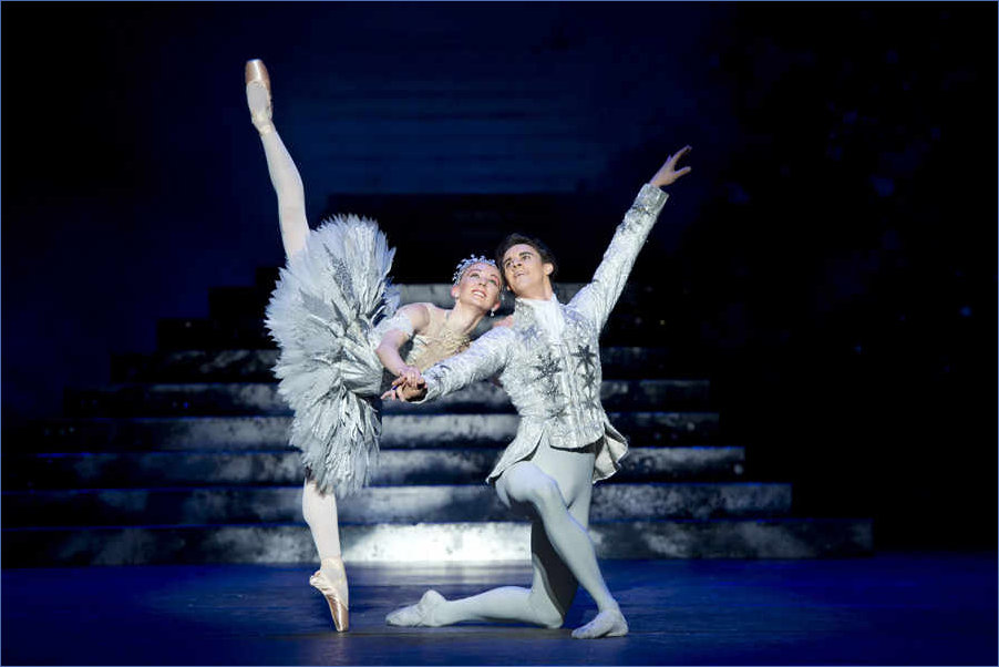 Cinderella and Prince Charming in classic ballet pose