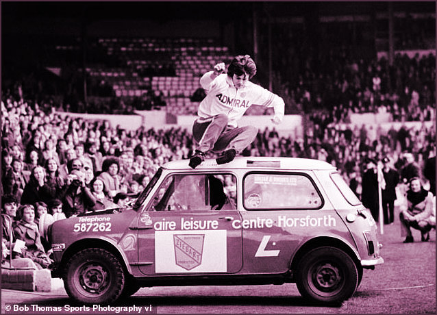 Duncan McKenzie leaping over a Mini