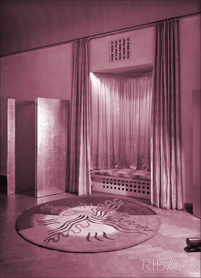 Corner of a music room with rug designed by Marion Dorn