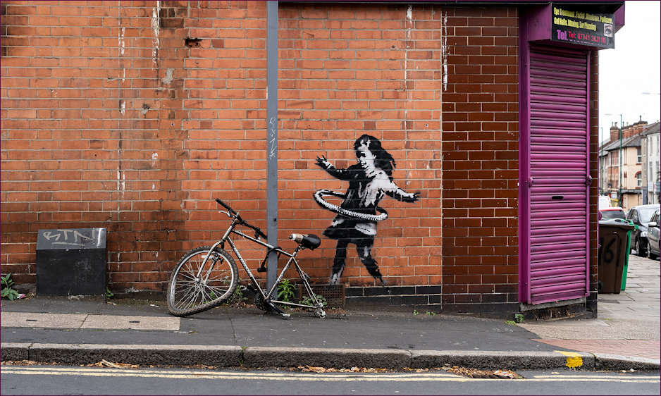 Banksy mural in Nottingham of Hoola Hoop Girl