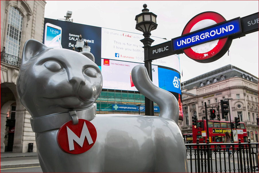 Two Icons the Monopoly Cat and the London Underground signage