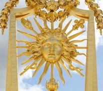 Gate featuring the Sun King at Versailles