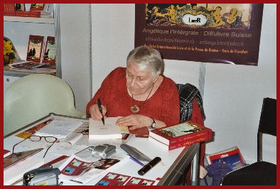 Author Anne Golon signing books