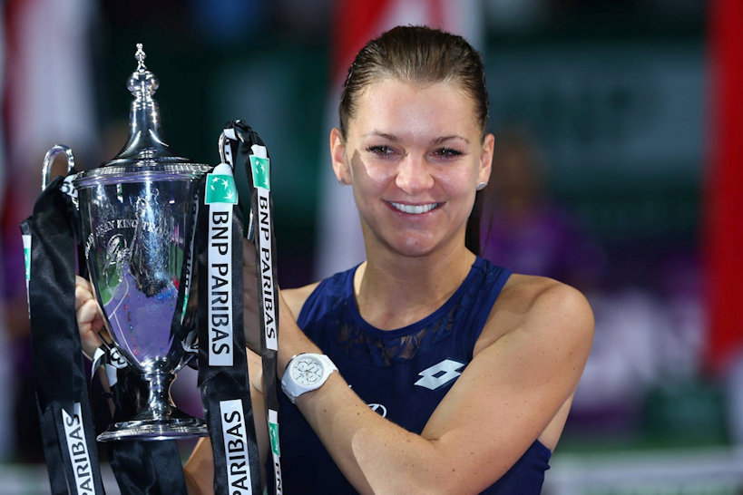 Champion on Court with Trophy