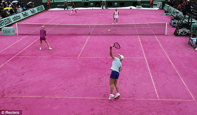 Navratilova serving in doubles
