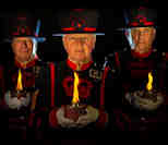 Three Beefeaters Lighting up new 2018 Poppy Initiative at the Tower of London