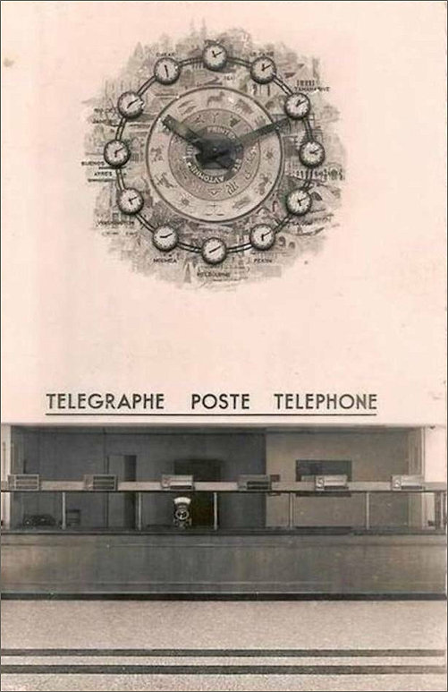 The Clock on the wall above the Rabac and Information Wings with Post Office Counter