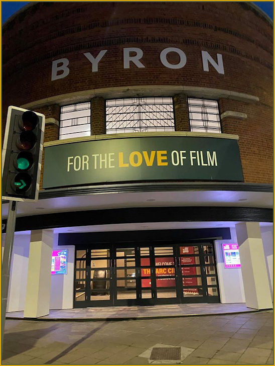 The Byron all lit up at night