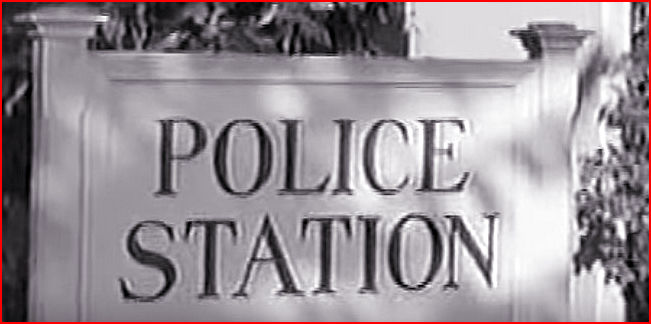 Police Station Sign close-up