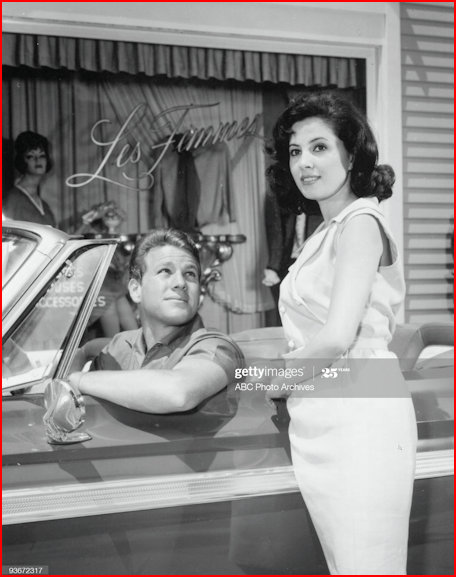 Betty and Rodney outside the Dress Shop