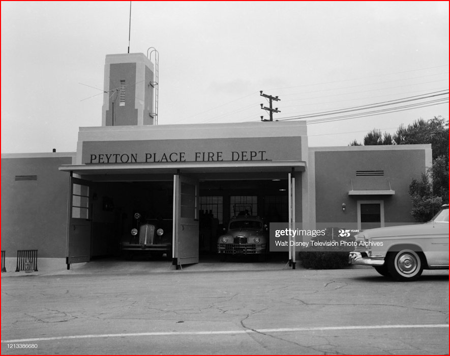 Frontage of the Peyton Place Fire Department with two fire vehicles visible