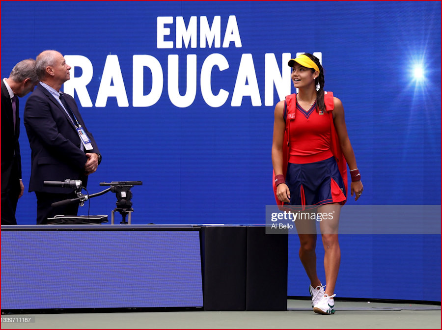 Emma against the backdrop to her name US Open 2021